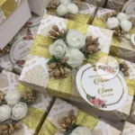 Flower Box With Zari Ribbon And Tai