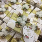 Flower Box With Zari Ribbon And Tai