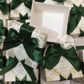 Green Ribbon Box With Tai And Tag