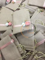 Jute Pouch With Flowers And Ribbon