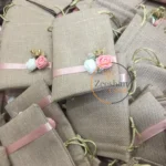 Jute Pouch With Flowers And Ribbon