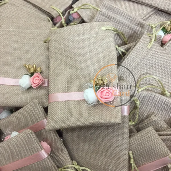 Jute Pouch With Flowers And Ribbon