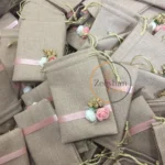 Jute Pouch With Flowers And Ribbon