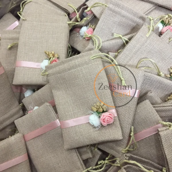 Jute Pouch With Flowers And Ribbon