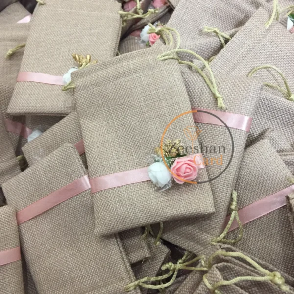 Jute Pouch With Flowers And Ribbon