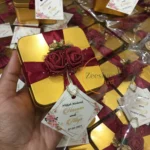 Maroon Flower And Ribbon With Tag